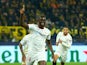 Tanguy Nianzou celebrates scoring for Sevilla against Borussia Dortmund on October 11, 2022