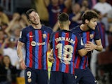 Barcelona's Robert Lewandowski celebrates scoring their second goal with teammates on October 20, 2022