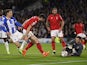 Nottingham Forest's Dean Henderson and Scott McKenna in action with Brighton & Hove Albion's Solly March on October 18, 2022