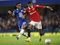 Chelsea's Raheem Sterling in action with Manchester United's Marcus Rashford on October 22, 2022