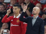 Manchester United's Cristiano Ronaldo with manager Erik ten Hag before coming on as a substitute on August 22, 2022