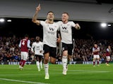 Fulham's Aleksandar Mitrovic celebrates scoring their second goal with Fulham's Harrison Reed on October 20, 2022