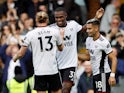 Fulham's Issa Diop celebrates scoring their first goal with Andreas Pereira and Tim Ream on October 15, 2022