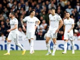 Leeds United's Marc Roca and teammates look dejected after conceding their second goal on October 23, 2022