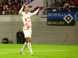 Yussuf Poulsen celebrates scoring for RB Leipzig on October 18, 2022