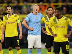 Man City secure top spot, Dortmund qualify as both sides share spoils