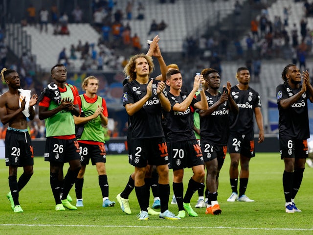 Reims players clap the fans following defeat to Marseille in October 2022