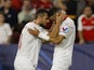 Sevilla's Youssef En-Nesyri celebrates scoring their first goal with Joan Jordan on October 25, 2022