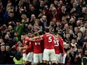 Manchester United players celebrate Marcus Rashford's goal against West Ham United on October 30, 2022