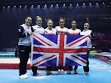 Great Britain celebrate winning women's team silver at the World Artistic Gymnastics Championships on November 1, 2022