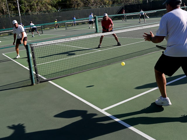 Pickleball players pictured in action in March 2020