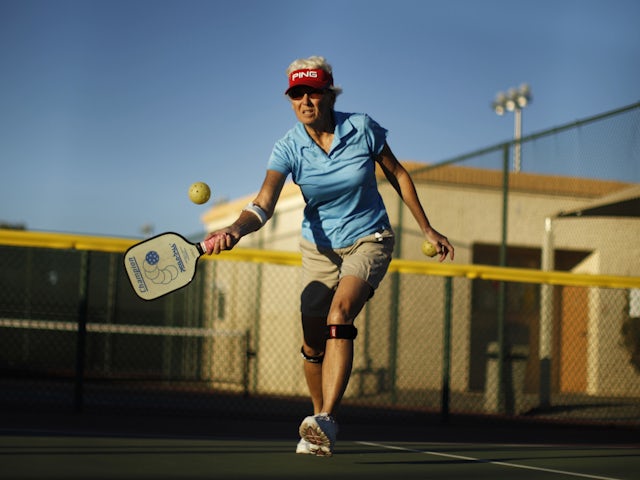 A pickleball player in action in January 2013