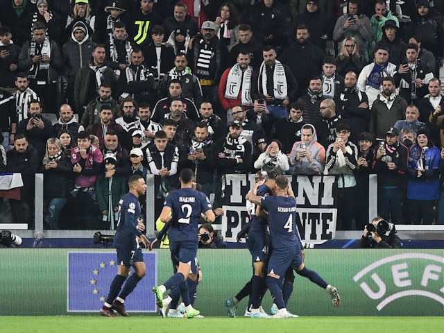Paris Saint-Germain's (PSG) Nuno Mendes celebrates scoring their second goal with teammates on November 2, 2022