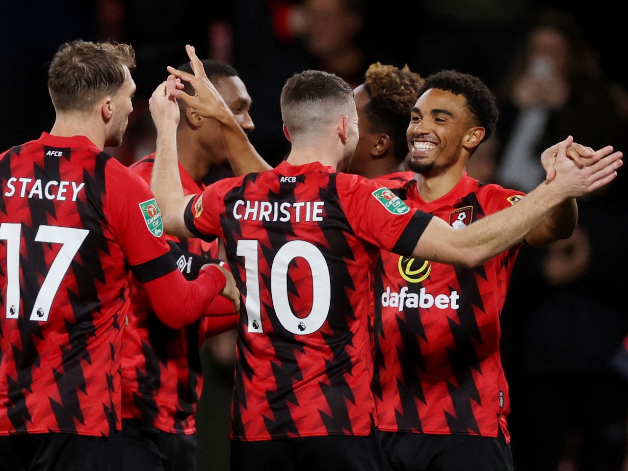 Bournemouth celebrate scoring against Everton in the EFL Cup on ...