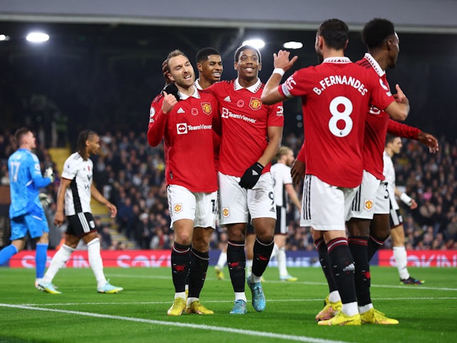 Manchester United players celebrate Christian Eriksen's goal against Fulham on November 13, 2022