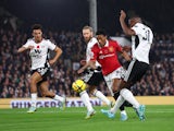 Manchester United's Anthony Martial in action with Fulham's Issa Diop on November 13, 2022