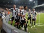Newcastle United's Joe Willock celebrates scoring their first goal with teammates on November 12, 2022