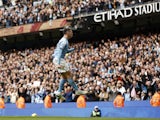 Manchester City's Phil Foden celebrates scoring their first goal on November 12, 2022