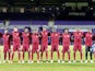 Qatar players line up during the national anthems before the match in September 2022
