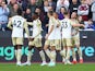 Leicester City players celebrate James Maddison's goal against West Ham United on November 12, 2022