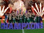 Australia's James Tedesco holds aloft the trophy as they celebrate winning the Men's World Cup Final on November 19, 2022