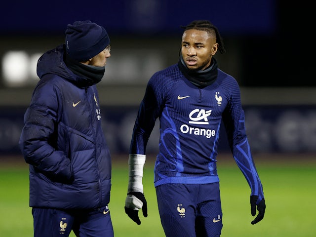 France's Christopher Nkunku leaves the training pitch after sustaining an injury on November 15, 2022