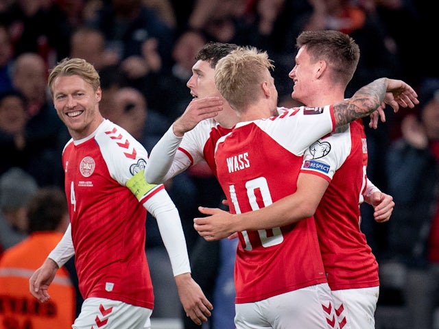 Denmark's Joakim Maehle celebrates scoring their first goal with Simon Kjaer, Andreas Christensen and Daniel Wass in October 2021