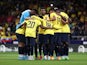 Ecuador players huddle before the match on November 12, 2022