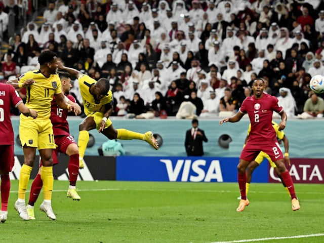 Ecuador forward Enner Valencia scoring a header against Qatar at the World Cup on November 20, 2022.