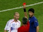 Referee Horacio Elizondo (C) of Argentina shows France's Zinedine Zidane (L) a red card next to Italy's Gennaro Gattuso during their World Cup 2006 final soccer match in Berlin July 9, 2006