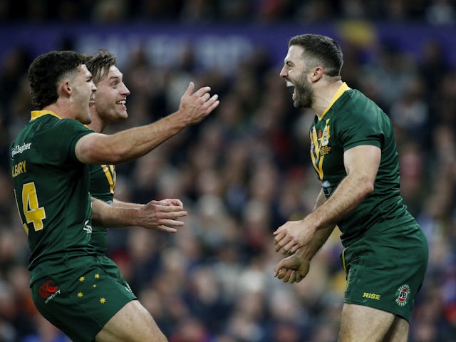 Australia's James Tedesco celebrates scoring their second try with teammates on November 19, 2022