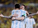 Argentina's Julian Alvarez celebrates scoring their first goal with Lionel Messi on March 29, 2022