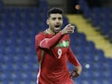 Iran's Mehdi Taremi celebrates scoring their first goal in September 2022