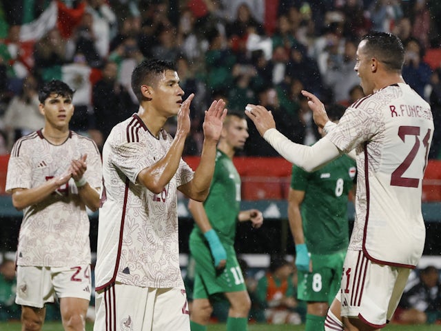 Mexico's Uriel Antuna scores their fourth goal with Rogelio Funes Mori on November 9, 2022