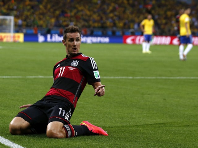 Germany's Miroslav Klose celebrates after scoring a goal during the 2014 World Cup semi-finals between Brazil and Germany at the Mineirao stadium in Belo Horizonte July 8, 2014