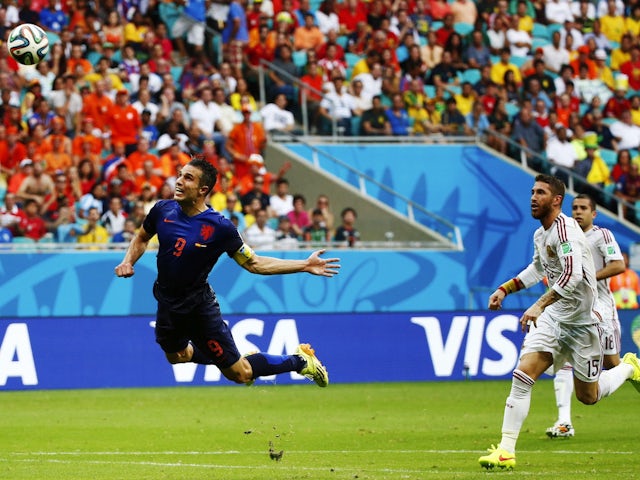 Robin van Persie scores his famous diving header goal against Spain at the 2014 World Cup