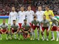 Poland players pose for a team group photo before the match in September 2022