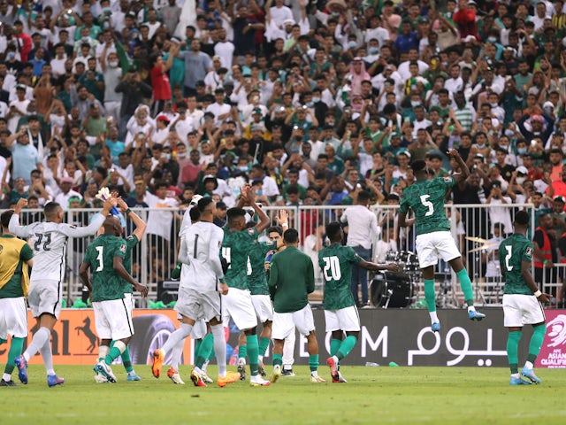 Saudi Arabia players celebrate qualifying for the 2022 World Cup