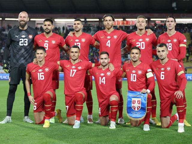 Serbia players pose for a team group photo before the match in September 2022