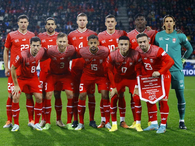 Switzerland players pose for a team group photo before the match in September 2022