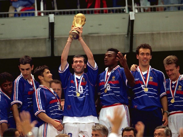France's Zinedine Zidane holds the World Cup trophy aloft in 1998