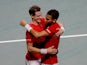 Canada's Vasek Pospisil and Felix Auger-Aliassime celebrate winning their match in the semi final against Italy in the Davis Cup on November 26, 2022