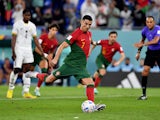 Cristiano Ronaldo scores a penalty for Portugal against Ghana at the World Cup on November 24, 2022