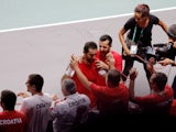 Croatia's Marin Cilic celebrates with teammates after winning his quarter final match against Spain's Pablo Carreno-Busta at the Davis Cup on November 23, 2022
