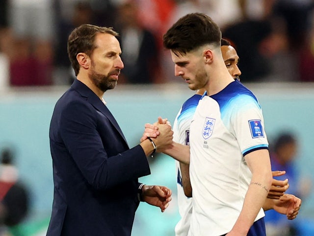 England midfielder Declan Rice pictured with Three Lions boss Gareth Southgate on November 21, 2022