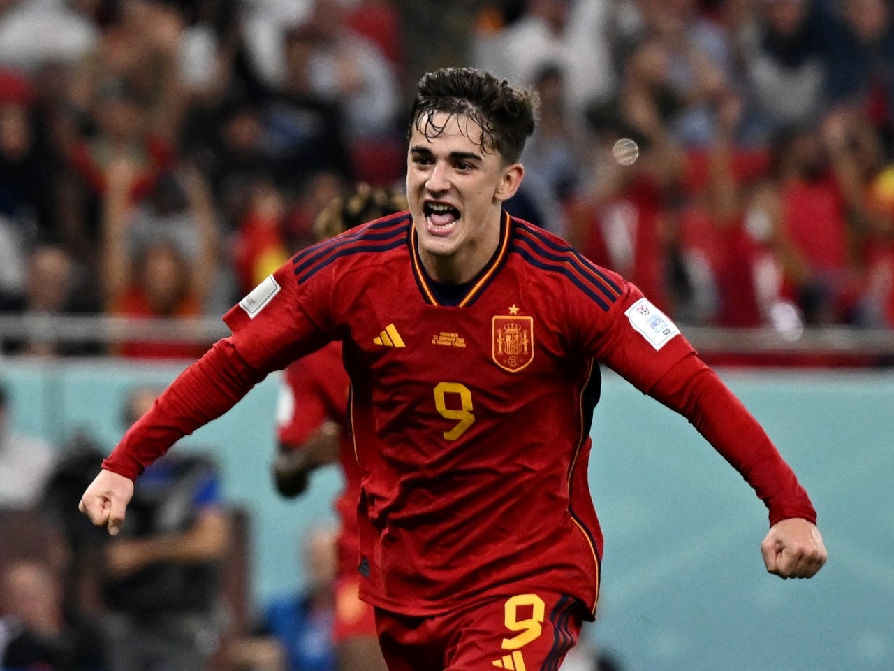Spain's Gavi celebrates scoring their fifth goal on November 23, 2022