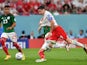 Mexico's Hector Moreno concedes a penalty against Poland's Robert Lewandowski November 22, 2022