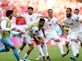 Iran score two late goals to beat 10-man Wales