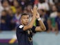 France's Kylian Mbappe applauds fans after the match on November 22, 2022