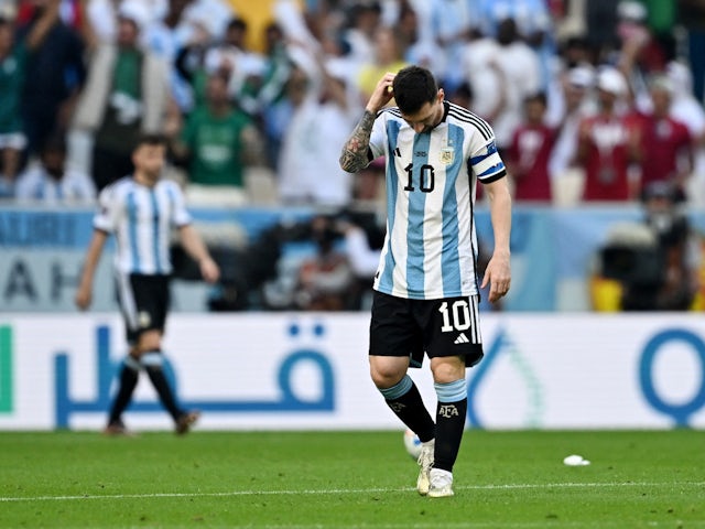 Argentina's Lionel Messi looks dejected after Saudi Arabia score their first goal on November 22, 2022
